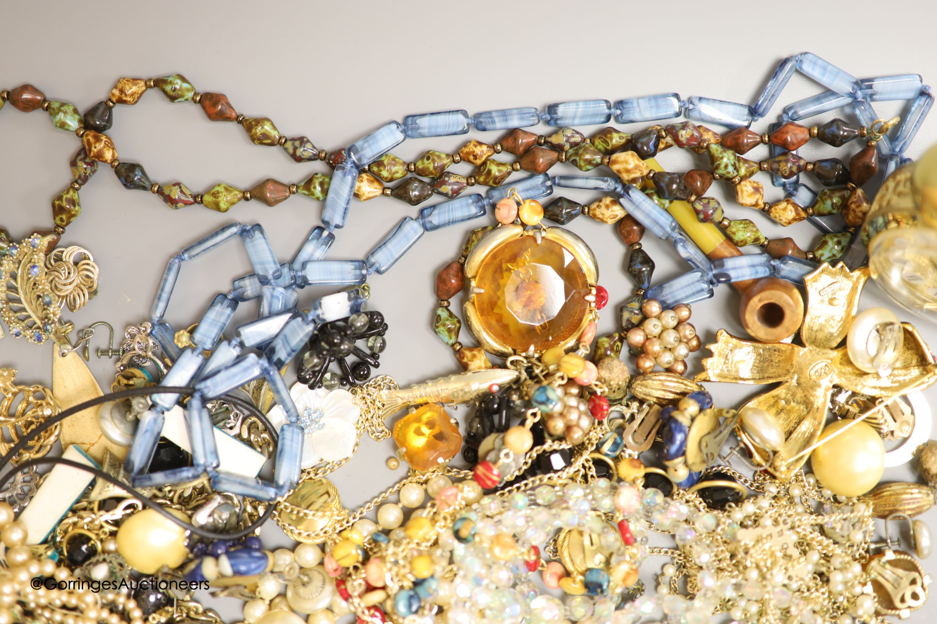 A collection of costume jewellery and other items, including a mother of pearl flower pendant with 9ct suspension